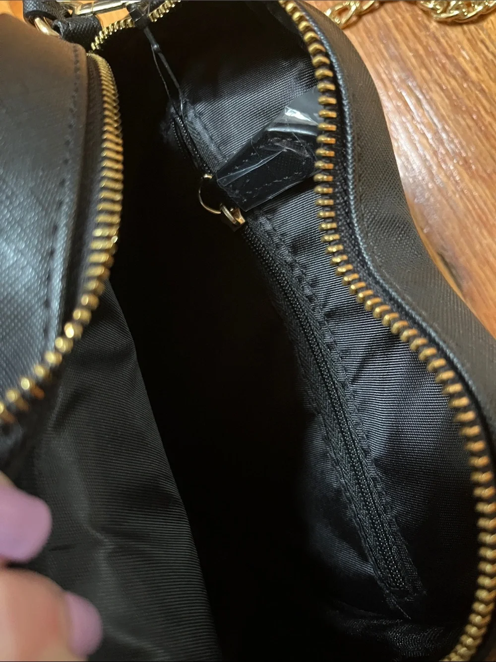 GUESS Black Heart Crossbody with Gold Chain Detail